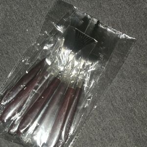 Set of Stainless Steel Utensils with Dark Handles